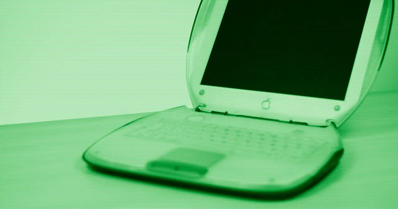 Old laptop computer on a desk, ready to be revived with a lightweight Linux distro