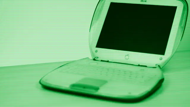 Old laptop computer on a desk, ready to be revived with a lightweight Linux distro