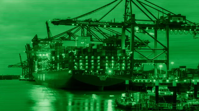 Stacked cargo shipping containers at a port, a metaphor for software containers