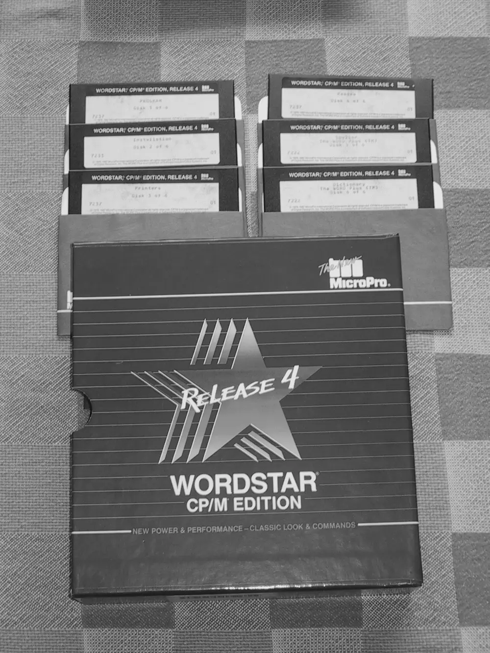 5¼-inch diskettes and packaging of WordStar 4 for 8-bit CP/M