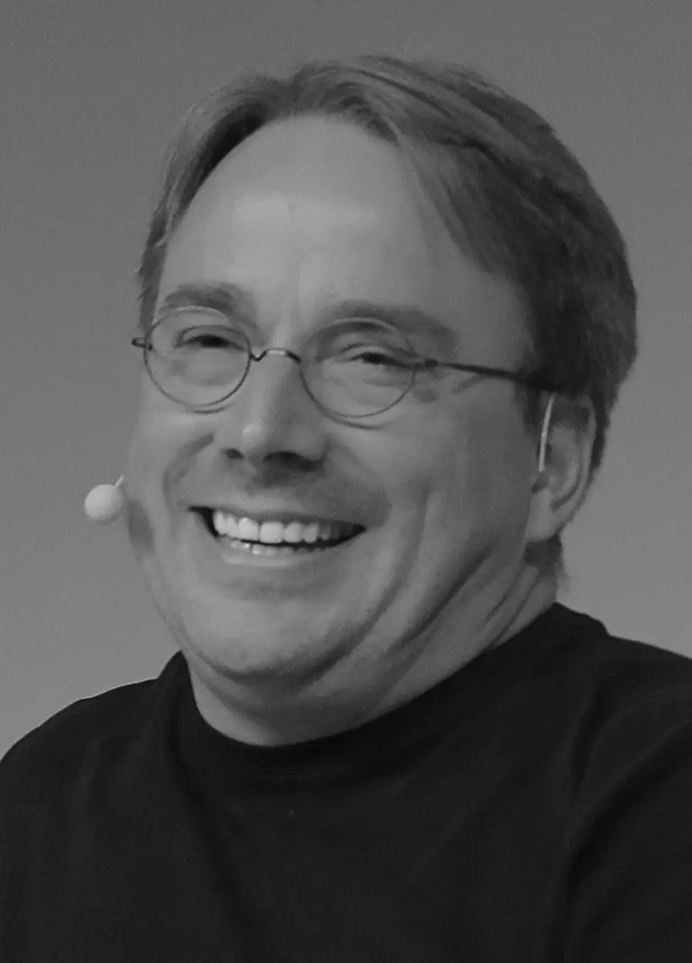 Portrait of Linus Torvalds, creator of the Linux kernel, at a LinuxCon conference