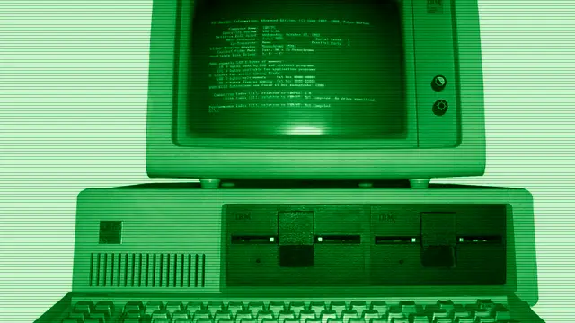 IBM PC 5150 computer with keyboard and green monochrome 5151 monitor, the machine PC DOS was created for