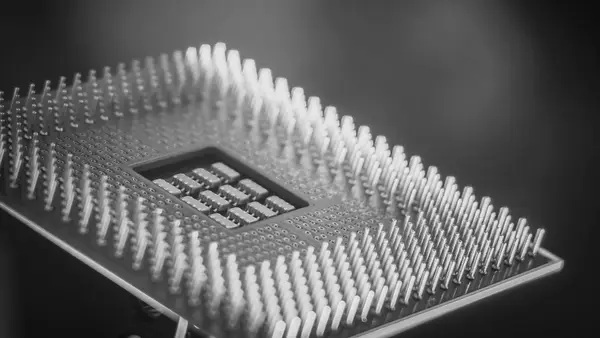 Macro close-up of a computer processor with its gold pins