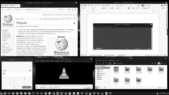 Manjaro Linux desktop with several open-source applications running