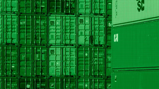 Stacked shipping containers at a port as a metaphor for software containers